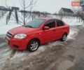 Красный Шевроле Авео, объемом двигателя 1.5 л и пробегом 238 тыс. км за 3350 $, фото 1 на Automoto.ua