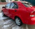 Красный Шевроле Авео, объемом двигателя 1.5 л и пробегом 200 тыс. км за 2600 $, фото 1 на Automoto.ua