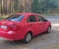 Красный Шевроле Авео, объемом двигателя 1.5 л и пробегом 241 тыс. км за 3300 $, фото 2 на Automoto.ua