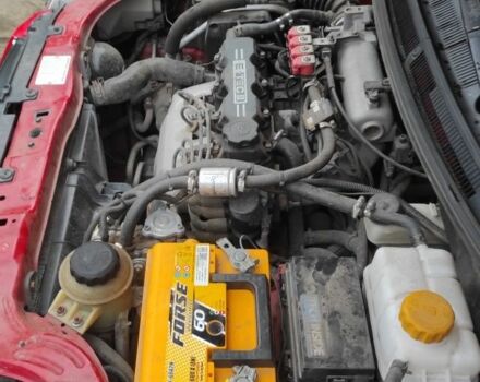 Красный Шевроле Авео, объемом двигателя 1.5 л и пробегом 200 тыс. км за 4500 $, фото 10 на Automoto.ua