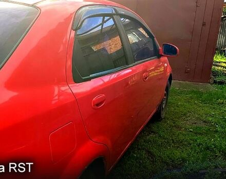 Красный Шевроле Авео, объемом двигателя 1.5 л и пробегом 160 тыс. км за 3300 $, фото 5 на Automoto.ua