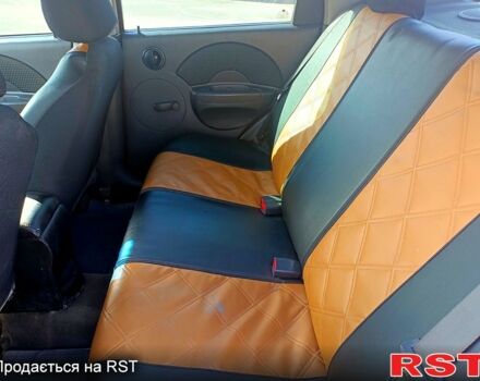 Красный Шевроле Авео, объемом двигателя 1.5 л и пробегом 190 тыс. км за 3100 $, фото 9 на Automoto.ua