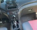 Красный Шевроле Авео, объемом двигателя 1.5 л и пробегом 210 тыс. км за 3400 $, фото 7 на Automoto.ua