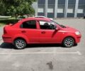 Красный Шевроле Авео, объемом двигателя 1.5 л и пробегом 201 тыс. км за 4000 $, фото 2 на Automoto.ua