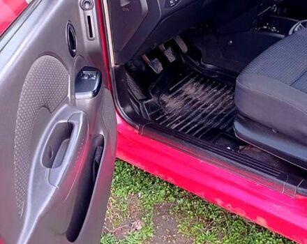 Красный Шевроле Авео, объемом двигателя 1.5 л и пробегом 250 тыс. км за 2200 $, фото 4 на Automoto.ua