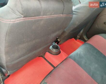 Красный Шевроле Авео, объемом двигателя 1.5 л и пробегом 226 тыс. км за 3500 $, фото 1 на Automoto.ua