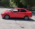 Красный Шевроле Авео, объемом двигателя 1.5 л и пробегом 201 тыс. км за 4000 $, фото 1 на Automoto.ua