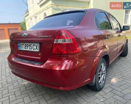 Красный Шевроле Авео, объемом двигателя 1.5 л и пробегом 260 тыс. км за 2600 $, фото 2 на Automoto.ua