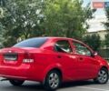 Красный Шевроле Авео, объемом двигателя 1.5 л и пробегом 228 тыс. км за 3999 $, фото 1 на Automoto.ua