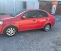 Красный Шевроле Авео, объемом двигателя 1.5 л и пробегом 350 тыс. км за 2600 $, фото 1 на Automoto.ua