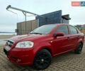 Красный Шевроле Авео, объемом двигателя 1.5 л и пробегом 245 тыс. км за 4100 $, фото 1 на Automoto.ua