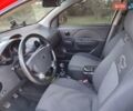 Красный Шевроле Авео, объемом двигателя 1.5 л и пробегом 190 тыс. км за 3300 $, фото 13 на Automoto.ua