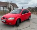 Красный Шевроле Авео, объемом двигателя 1.5 л и пробегом 130 тыс. км за 2300 $, фото 1 на Automoto.ua