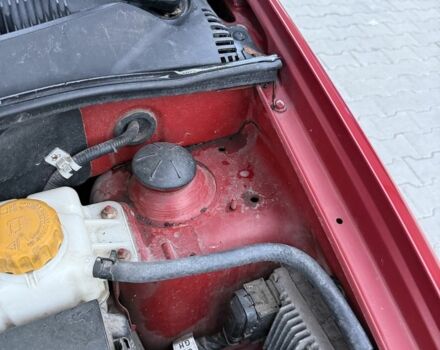 Красный Шевроле Авео, объемом двигателя 1.4 л и пробегом 180 тыс. км за 3300 $, фото 7 на Automoto.ua