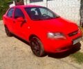 Червоний Шевроле Авео, об'ємом двигуна 1.5 л та пробігом 150 тис. км за 2600 $, фото 1 на Automoto.ua