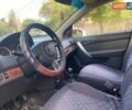 Червоний Шевроле Авео, об'ємом двигуна 1.5 л та пробігом 260 тис. км за 2600 $, фото 4 на Automoto.ua