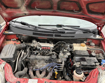 Красный Шевроле Авео, объемом двигателя 1.5 л и пробегом 107 тыс. км за 2100 $, фото 13 на Automoto.ua