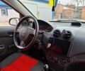 Красный Шевроле Авео, объемом двигателя 1.5 л и пробегом 265 тыс. км за 3500 $, фото 12 на Automoto.ua