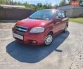 Красный Шевроле Авео, объемом двигателя 1.4 л и пробегом 187 тыс. км за 4000 $, фото 1 на Automoto.ua