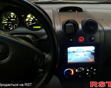 Красный Шевроле Авео, объемом двигателя 1.5 л и пробегом 280 тыс. км за 2800 $, фото 5 на Automoto.ua