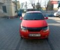 Красный Шевроле Авео, объемом двигателя 1.5 л и пробегом 290 тыс. км за 2400 $, фото 1 на Automoto.ua