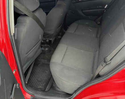 Красный Шевроле Авео, объемом двигателя 1.5 л и пробегом 260 тыс. км за 3400 $, фото 11 на Automoto.ua