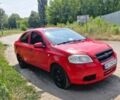 Червоний Шевроле Авео, об'ємом двигуна 1.5 л та пробігом 185 тис. км за 1950 $, фото 1 на Automoto.ua