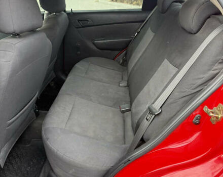 Красный Шевроле Авео, объемом двигателя 1.5 л и пробегом 187 тыс. км за 3300 $, фото 12 на Automoto.ua