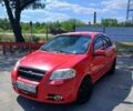 Красный Шевроле Авео, объемом двигателя 1.5 л и пробегом 290 тыс. км за 3300 $, фото 1 на Automoto.ua