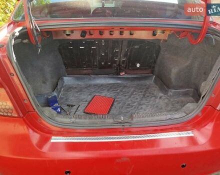 Красный Шевроле Авео, объемом двигателя 1.5 л и пробегом 226 тыс. км за 3500 $, фото 6 на Automoto.ua