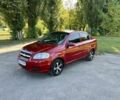 Красный Шевроле Авео, объемом двигателя 1.5 л и пробегом 215 тыс. км за 3800 $, фото 1 на Automoto.ua