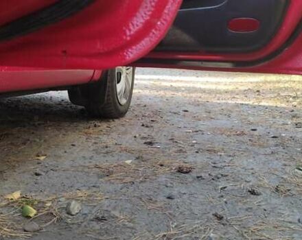 Красный Шевроле Авео, объемом двигателя 1.5 л и пробегом 241 тыс. км за 3500 $, фото 9 на Automoto.ua