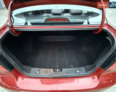 Красный Шевроле Авео, объемом двигателя 1.4 л и пробегом 180 тыс. км за 3300 $, фото 13 на Automoto.ua