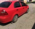 Красный Шевроле Авео, объемом двигателя 1.5 л и пробегом 180 тыс. км за 3800 $, фото 2 на Automoto.ua