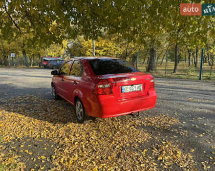Красный Шевроле Авео, объемом двигателя 1.5 л и пробегом 230 тыс. км за 3750 $, фото 2 на Automoto.ua