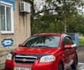 Красный Шевроле Авео, объемом двигателя 1.5 л и пробегом 127 тыс. км за 5400 $, фото 1 на Automoto.ua