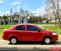 Красный Шевроле Авео, объемом двигателя 1.5 л и пробегом 270 тыс. км за 3500 $, фото 2 на Automoto.ua