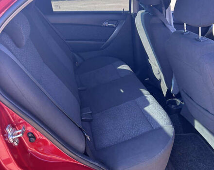 Красный Шевроле Авео, объемом двигателя 1.5 л и пробегом 199 тыс. км за 4300 $, фото 1 на Automoto.ua