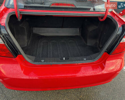 Красный Шевроле Авео, объемом двигателя 1.5 л и пробегом 131 тыс. км за 4543 $, фото 7 на Automoto.ua