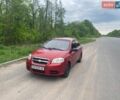 Красный Шевроле Авео, объемом двигателя 1.5 л и пробегом 275 тыс. км за 3300 $, фото 1 на Automoto.ua