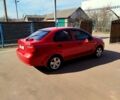 Красный Шевроле Авео, объемом двигателя 1.6 л и пробегом 255 тыс. км за 3300 $, фото 4 на Automoto.ua