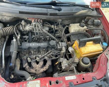 Червоний Шевроле Авео, об'ємом двигуна 1.5 л та пробігом 294 тис. км за 2800 $, фото 3 на Automoto.ua