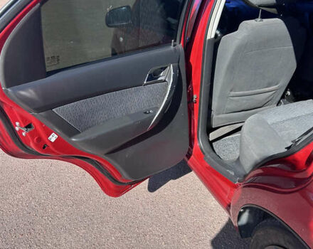 Красный Шевроле Авео, объемом двигателя 1.5 л и пробегом 199 тыс. км за 4300 $, фото 5 на Automoto.ua