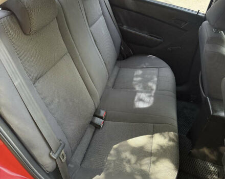 Красный Шевроле Авео, объемом двигателя 1.5 л и пробегом 230 тыс. км за 3750 $, фото 7 на Automoto.ua