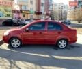 Красный Шевроле Авео, объемом двигателя 1.5 л и пробегом 378 тыс. км за 2600 $, фото 1 на Automoto.ua