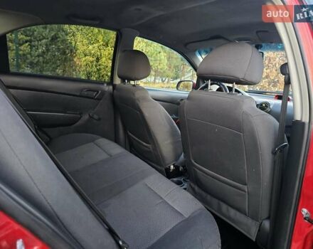 Шевроле Авео 2007 у Хмельницькому на Automoto.ua Червоний Шевроле Авео, об'ємом двигуна 1.5 л та пробігом 180 тис. км за 3299 $, фото 32 на Automoto.ua