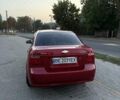 Красный Шевроле Авео, объемом двигателя 1.5 л и пробегом 200 тыс. км за 3800 $, фото 1 на Automoto.ua