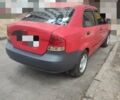 Красный Шевроле Авео, объемом двигателя 1.5 л и пробегом 295 тыс. км за 3000 $, фото 1 на Automoto.ua