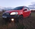Красный Шевроле Авео, объемом двигателя 1.5 л и пробегом 320 тыс. км за 3000 $, фото 1 на Automoto.ua