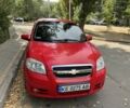 Красный Шевроле Авео, объемом двигателя 1.5 л и пробегом 215 тыс. км за 3800 $, фото 1 на Automoto.ua